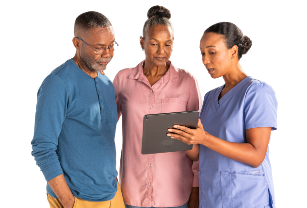 Man and a woman standing next to a nurse with a clipboard